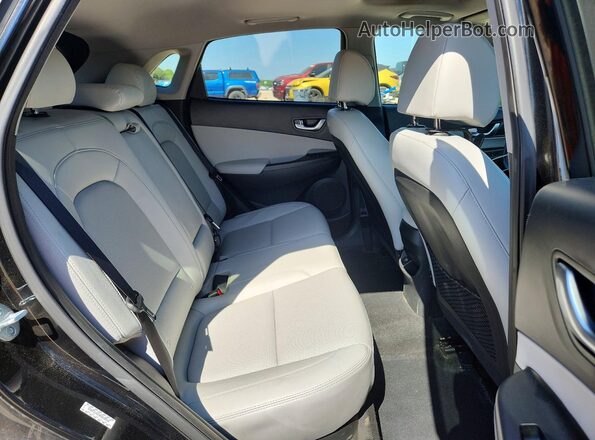 KM8K5CA33PU048644 2023 HYUNDAI KONA Black Vista interior trasera