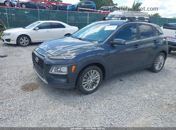 KM8K6CAA1KU352897 2019 HYUNDAI KONA Gray Vista tres cuartos delantera izquierda