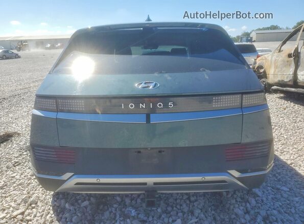 KM8KM4AE1NU064946 2022 HYUNDAI IONIQ Turquoise Widok z tyłu