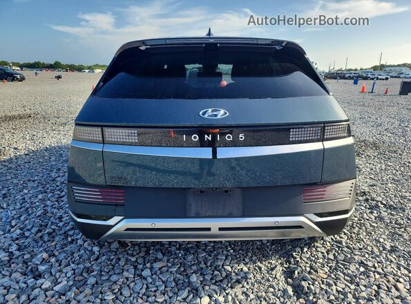 KM8KM4AE5NU114750 2022 HYUNDAI IONIQ Teal Widok z tyłu