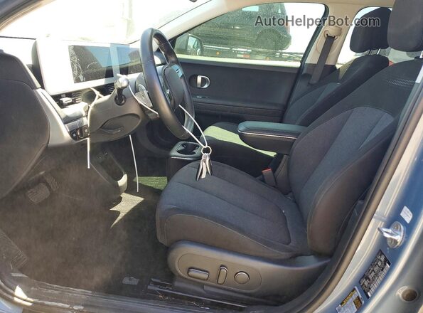 KM8KM4AE9PU128346 2023 HYUNDAI IONIQ Turquoise Front interior view