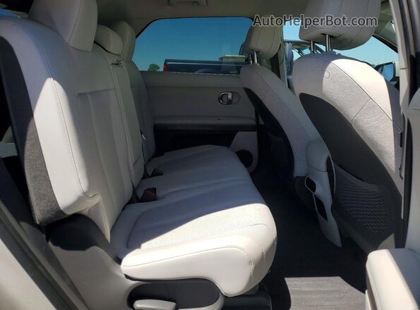 KM8KN4AE6PU125871 2023 HYUNDAI IONIQ Серебряный Вид задней части салона