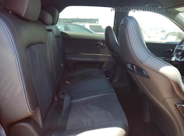 KM8KNDA85SU003389 2025 HYUNDAI IONIQ Orange Vista interior trasera