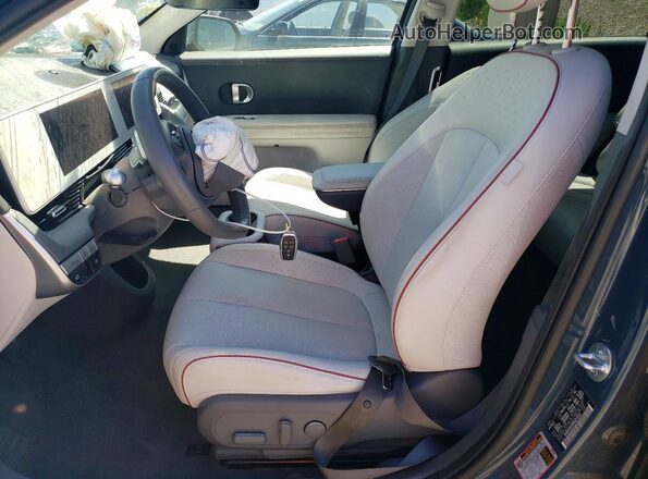KM8KNDAF0PU215316 2023 HYUNDAI IONIQ Blue Vista interior delantera