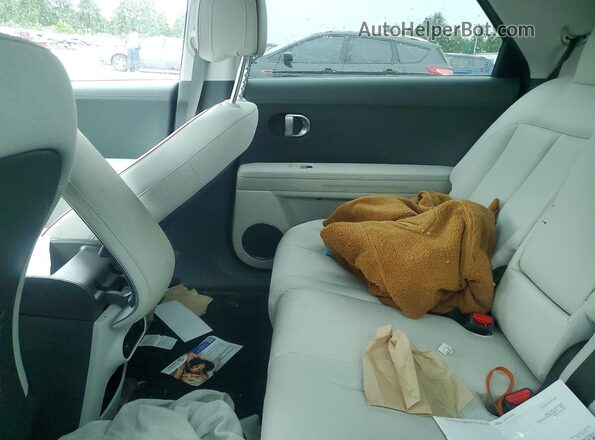 KM8KNDAF0PU215316 2023 HYUNDAI IONIQ Blue Vista de los asientos traseros