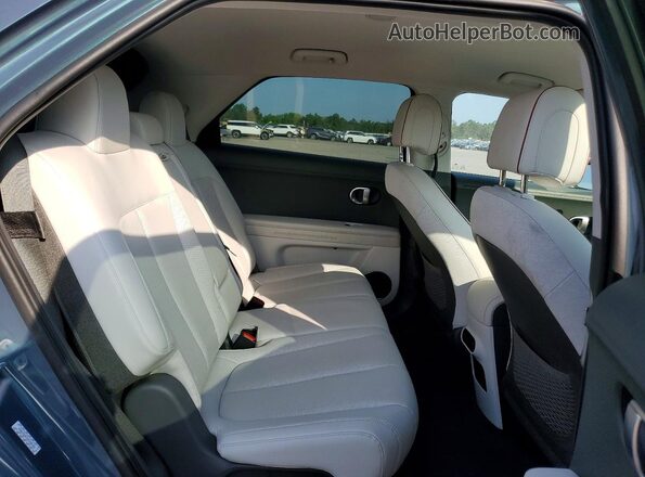 KM8KNDAF1PU190104 2023 HYUNDAI IONIQ Blue Rear interior view