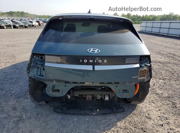 KM8KNDAF1PU190104 2023 HYUNDAI IONIQ Blue Rear view