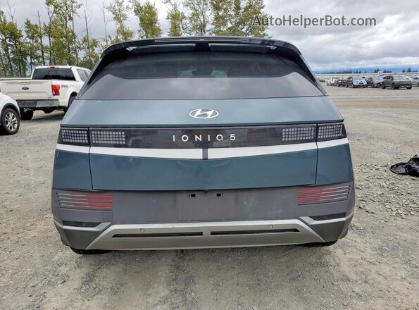 KM8KNDAF1PU207189 2023 HYUNDAI IONIQ Blue Հետևի տեսք