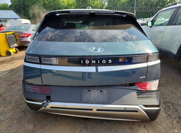 KM8KNDAF2PU141431 2023 HYUNDAI IONIQ Gray Rear view