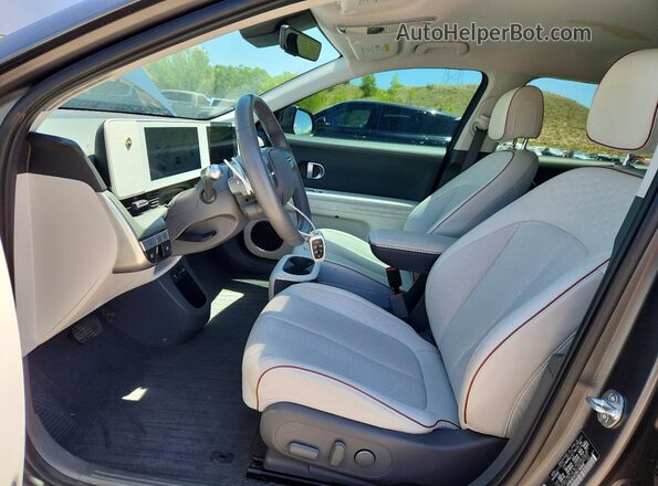 KM8KNDAF2PU188569 2023 HYUNDAI IONIQ Gray წინა სალონის ხედი