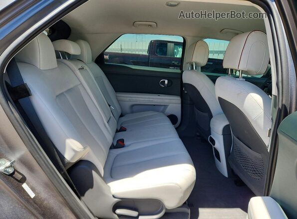 KM8KNDAF2PU188569 2023 HYUNDAI IONIQ Gray უკანა სალონის ხედი