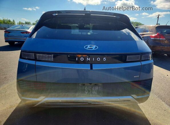 KM8KNDAF3PU229890 2023 HYUNDAI IONIQ Blue Հետևի տեսք