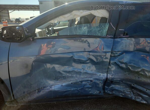 KM8KNDAF4PU232247 2023 HYUNDAI IONIQ Blue Widok wnętrza z przodu