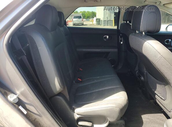 KM8KNDAF6PU181723 2023 HYUNDAI IONIQ Gray Widok wnętrza z tyłu