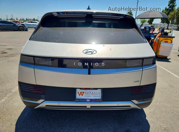 KM8KNDAF7PU154353 2023 HYUNDAI IONIQ Silver Вид ззаду