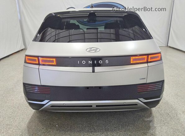 KM8KNDAF7PU199356 2023 HYUNDAI IONIQ Silver Rear view