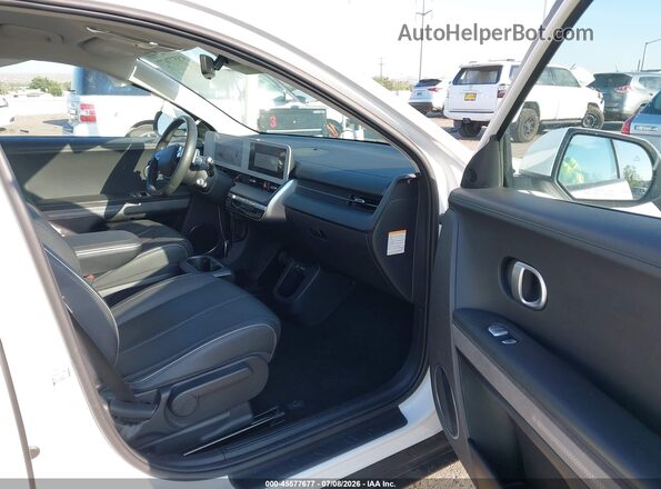 KM8KNDAF7PU208329 2023 HYUNDAI IONIQ 5 White Vista interior delantera