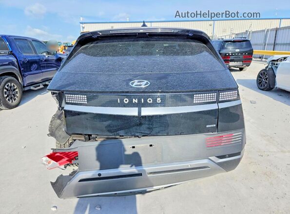 KM8KNDAF8PU210591 2023 HYUNDAI IONIQ Black უკანა ხედი