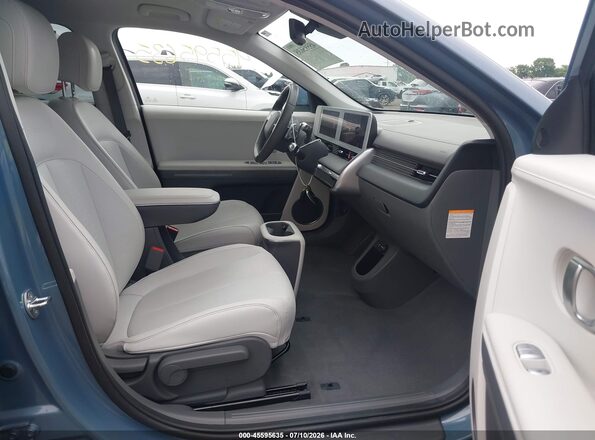 KM8KNDAF8PU214267 2023 HYUNDAI IONIQ 5 Blue Front interior view