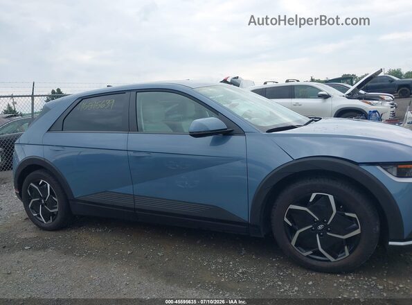 KM8KNDAF8PU214267 2023 HYUNDAI IONIQ 5 Blue Rear interior view