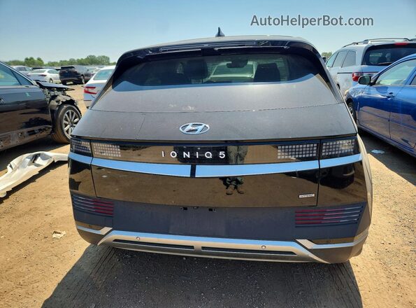 KM8KNDAF9PU207859 2023 HYUNDAI IONIQ Черный Вид сзади