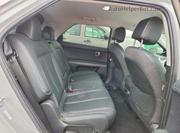 KM8KNDAFXPU154069 2023 HYUNDAI IONIQ Gray Vista de los asientos traseros