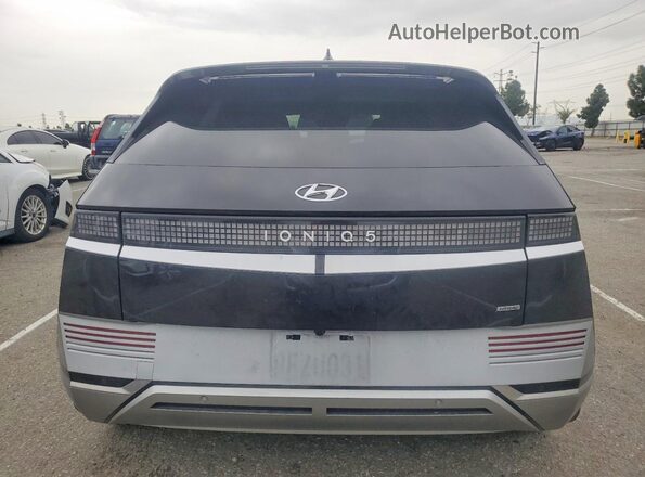 KM8KRDAF2PU176281 2023 HYUNDAI IONIQ Black Vista trasera