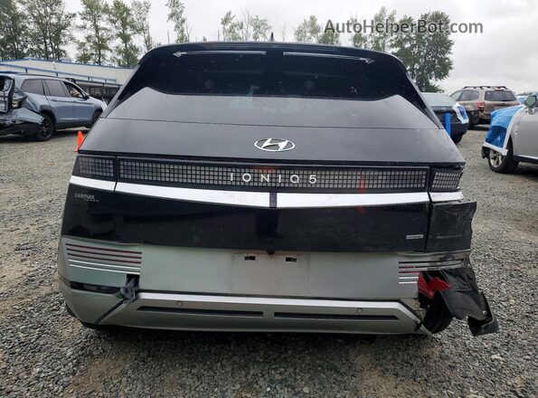 KM8KRDAF3PU182798 2023 HYUNDAI IONIQ Black უკანა ხედი