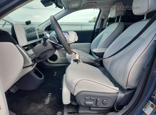 KM8KRDDF9RU310735 2024 HYUNDAI IONIQ Blue Vista interior delantera