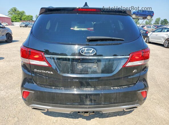KM8SM4HF4JU287488 2018 HYUNDAI SANTA Black Rear view
