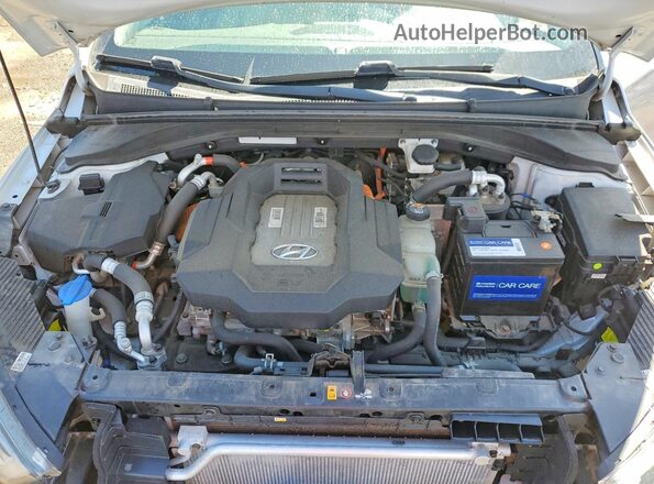 KMHC05LHXKU047359 2019 HYUNDAI IONIQ Silver Вид задньої частини салону