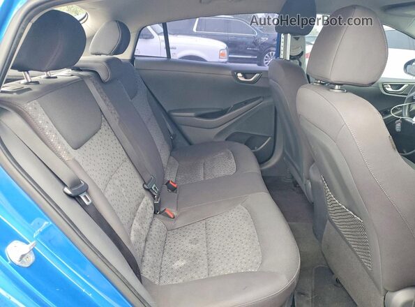 KMHC65LC0JU089783 2018 HYUNDAI IONIQ Blue Vista de los asientos traseros