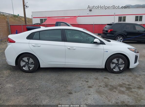 KMHC65LC0KU107989 2019 HYUNDAI IONIQ HYBRID White 360 interior view