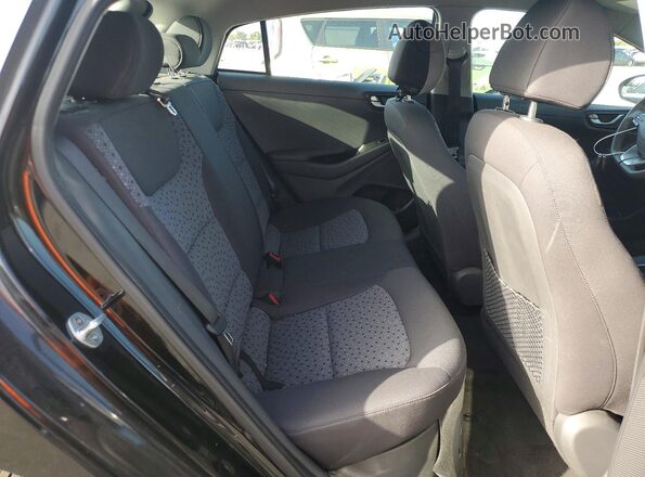 KMHC65LC1HU048475 2017 HYUNDAI IONIQ Black Widok tylnych siedzeń