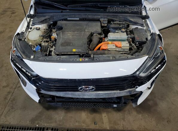 KMHC85LC7JU064938 2018 HYUNDAI IONIQ Белый Вид задней части салона