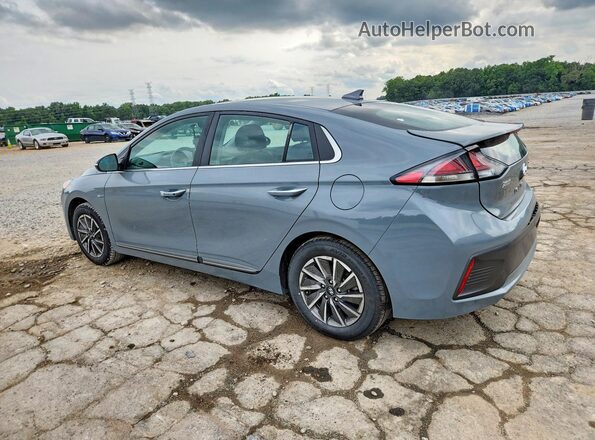 KMHC85LJ7LU074239 2020 HYUNDAI IONIQ Turquoise Trasero izquierdo