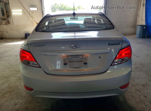 KMHCT4AE0GU110972 2016 HYUNDAI ACCENT Серебряный Вид сзади