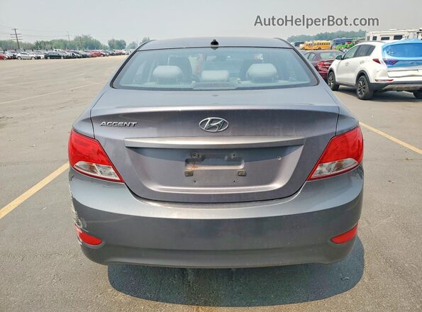 KMHCT4AE2GU105272 2016 HYUNDAI ACCENT Gray Rear view