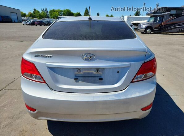 KMHCT4AE2GU981212 2016 HYUNDAI ACCENT Серебряный Вид сзади