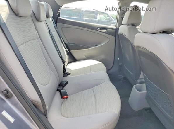 KMHCT4AE2HU182970 2017 HYUNDAI ACCENT Gray Rear seats view