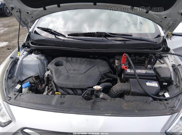 KMHCT4AE2HU350669 2017 HYUNDAI ACCENT Silver Widok z tyłu
