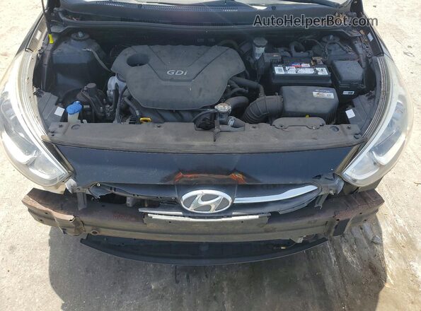 KMHCT4AE3GU974382 2016 HYUNDAI ACCENT Black Vista interior trasera
