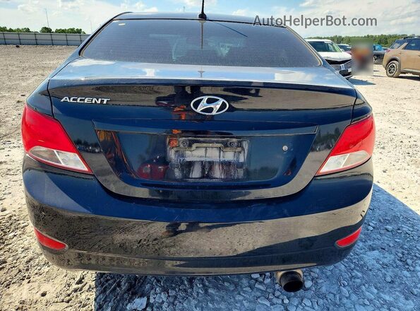 KMHCT4AE3HU358988 2017 HYUNDAI ACCENT Black Rear view