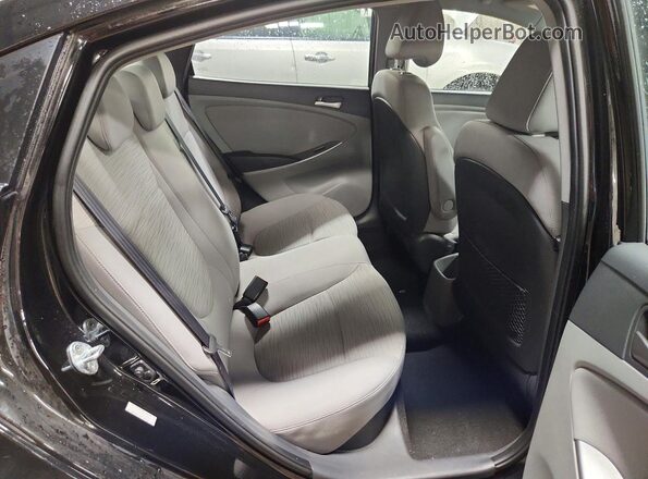 KMHCT4AE4GU089866 2016 HYUNDAI ACCENT Black Vista de los asientos traseros