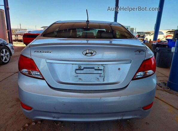 KMHCT4AE4GU163884 2016 HYUNDAI ACCENT Серебряный Вид сзади