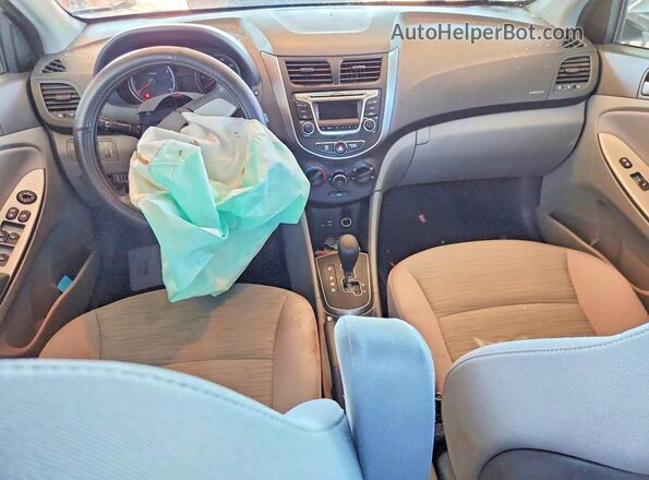 KMHCT4AE4GU163884 2016 HYUNDAI ACCENT Серебряный Вид панели приборов