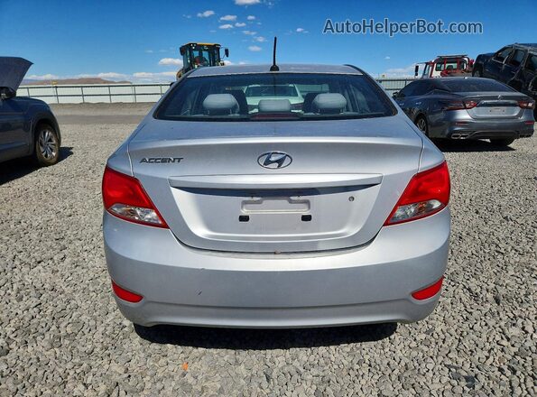 KMHCT4AE4GU948874 2016 HYUNDAI ACCENT Silver Вид ззаду