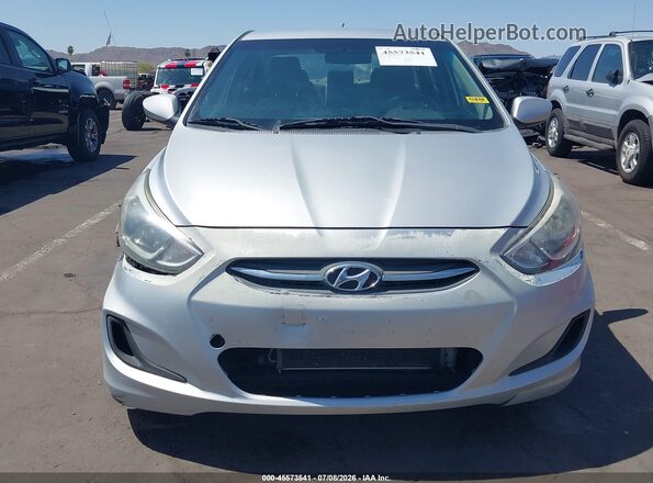 KMHCT4AE4GU980577 2016 HYUNDAI ACCENT Silver Vista interior trasera