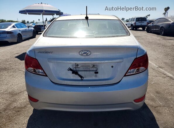 KMHCT4AE4GU999338 2016 HYUNDAI ACCENT Серебряный Вид сзади