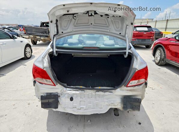 KMHCT4AE4HU244661 2017 HYUNDAI ACCENT Серебряный Вид сзади